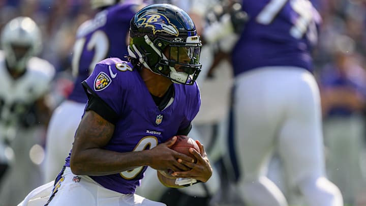 Sep 15, 2024; Baltimore, Maryland, USA; Baltimore Ravens quarterback Lamar Jackson (8) runs the ball during the second half against the Las Vegas Raiders at M&T Bank Stadium. Mandatory Credit: Reggie Hildred-Imagn Images
