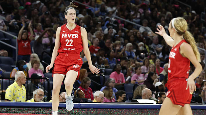 Aug 30, 2024; Chicago, Illinois, USA; Indiana Fever guard Caitlin Clark (22) celebrates after scoring against the Chicago Sky during the second half at Wintrust Arena. Mandatory Credit: Kamil Krzaczynski-Imagn Images