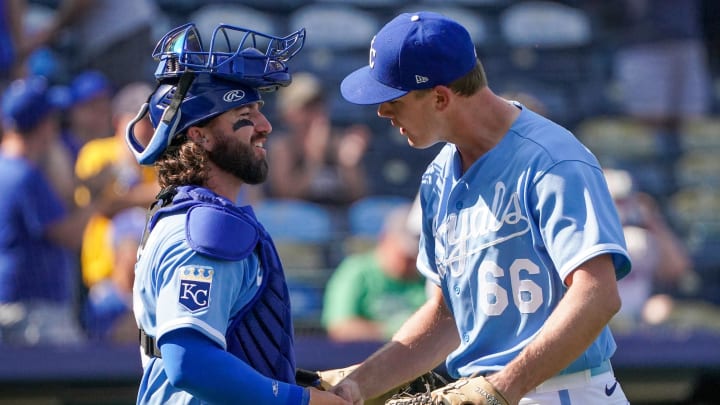 Sep 18, 2023; Kansas City, Missouri, USA; Kansas City Royals relief pitcher James McArthur (66) celebrates with catcher Logan Porter (88) after defeating the Cleveland Guardians at Kauffman Stadium.