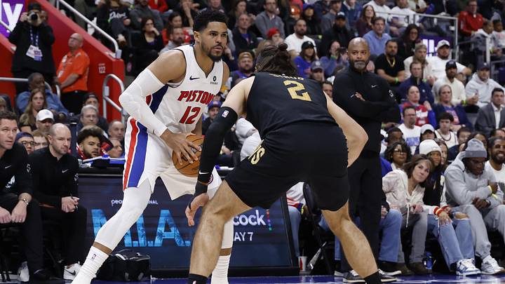 May 5, 2026; Detroit, Michigan, USA; Detroit Pistons forward Tobias Harris (12) is defended by Cleveland Cavaliers guard/forward Max Strus (2) in the second half during game one of the second round of the 2026 NBA Playoffs at Little Caesars Arena. Mandatory Credit: Rick Osentoski-Imagn Images
