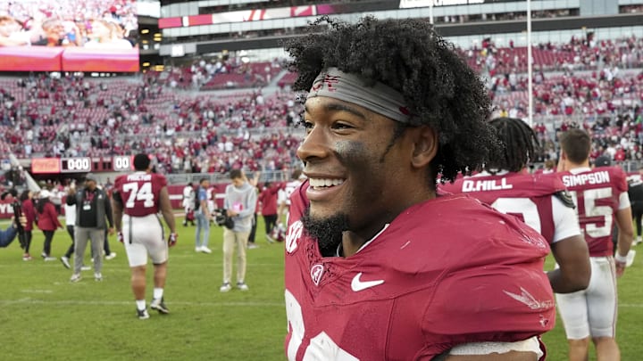 Nov 16, 2024; Tuscaloosa, AL, USA; Alabama Crimson Tide running back Justice Haynes (22) congratulates teammates as they leave the field after defeating the Mercer Bears at Bryant-Denny Stadium. Mandatory Credit: Gary Cosby Jr.-Imagn Images