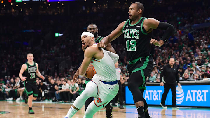 May 14, 2025; Boston, Massachusetts, USA; New York Knicks guard Josh Hart (3) loses his balance while Boston Celtics center Al Horford (42) defends in the first half during game five of the second round for the 2025 NBA Playoffs at TD Garden. Mandatory Credit: Bob DeChiara-Imagn Images