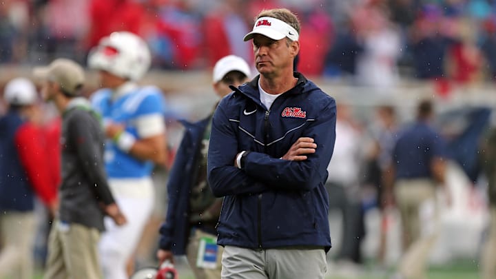 Nov 9, 2024; Oxford, Mississippi, USA; Mississippi Rebels head coach Lane Kiffin watches during warm ups prior to the game against the Georgia Bulldogs at Vaught-Hemingway Stadium. Mandatory Credit: Petre Thomas-Imagn Images