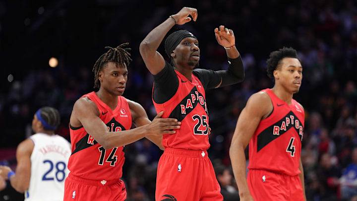 Feb 11, 2025; Philadelphia, Pennsylvania, USA; Toronto Raptors forward Chris Boucher (25) reacts with guard Ja'Kobe Walter (14) against the Philadelphia 76ers in the third quarter at Wells Fargo Center. Mandatory Credit: Kyle Ross-Imagn Images Feb 11, 2025; Philadelphia, Pennsylvania, USA; Toronto Raptors forward Chris Boucher (25) reacts with guard Ja'Kobe Walter (14) against the Philadelphia 76ers in the third quarter at Wells Fargo Center. Mandatory Credit: Kyle Ross-Imagn Images