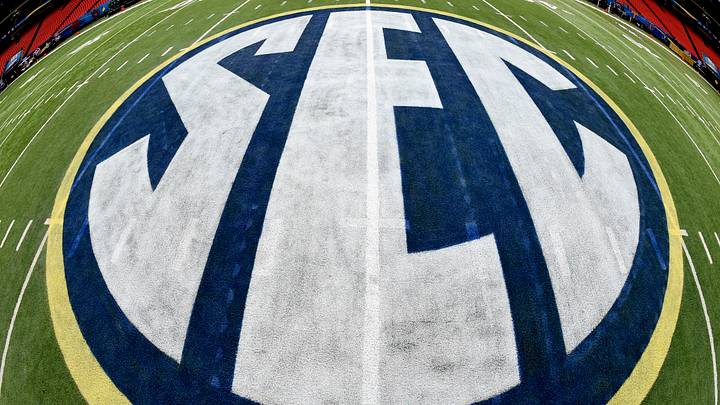 The SEC logo on the playing field at the Georgia Dome in preparation for the SEC Championship between the Alabama Crimson Tide and the Florida Gators. The SEC logo on the playing field at the Georgia Dome in preparation for the SEC Championship between the Alabama Crimson Tide and the Florida Gators.