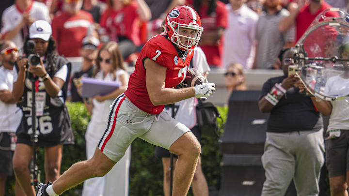 Sep 7, 2024; Athens, Georgia, USA; Georgia Bulldogs tight end Lawson Luckie (7) runs for a touchdown after a catch against the Tennessee Tech Golden Eagles during the second half at Sanford Stadium. Mandatory Credit: Dale Zanine-Imagn Images