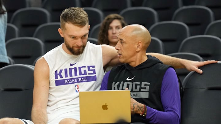 Oct 23, 2022; San Francisco, California, USA; Sacramento Kings assistant coach Doug Christie (right) talks to Sacramento Kings forward Domantas Sabonis (10, left) before the game against the Golden State Warriors at Chase Center. Mandatory Credit: Darren Yamashita-Imagn Images
