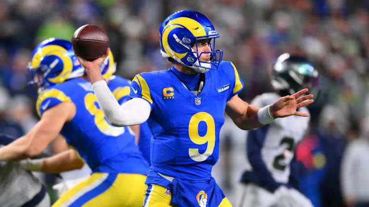 Rams quarterback Matthew Stafford throws a pass against the Seahawks in overtime at Lumen Field.