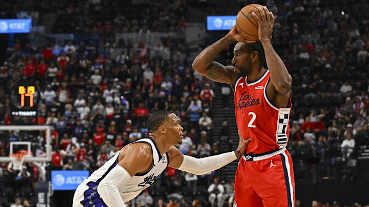 Mar 14, 2026; Inglewood, California, USA; LA Clippers forward Kawhi Leonard (2) looks to pass against Sacramento Kings guard Russell Westbrook (18) during the first quarter at Intuit Dome. Mandatory Credit: Jonathan Hui-Imagn Images Mar 14, 2026; Inglewood, California, USA; LA Clippers forward Kawhi Leonard (2) looks to pass against Sacramento Kings guard Russell Westbrook (18) during the first quarter at Intuit Dome. Mandatory Credit: Jonathan Hui-Imagn Images