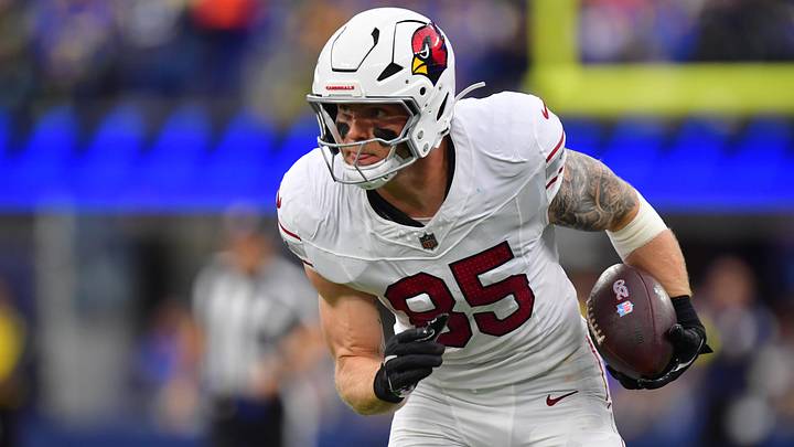 Arizona Cardinals tight end Trey McBride (85) runs after the catch against the Los Angeles Rams during the first half at SoFi Stadium. Mandatory Credit: Gary A. Vasquez-Imagn Images