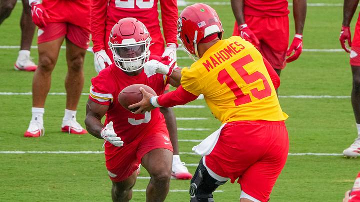Jul 29, 2026; St. Joseph, MO, USA; Kansas City Chiefs quarterback Patrick Mahomes (15) hands off to running back Kenneth Walker (9) during training camp at Missouri Western State University. Mandatory Credit: Denny Medley-Imagn Images