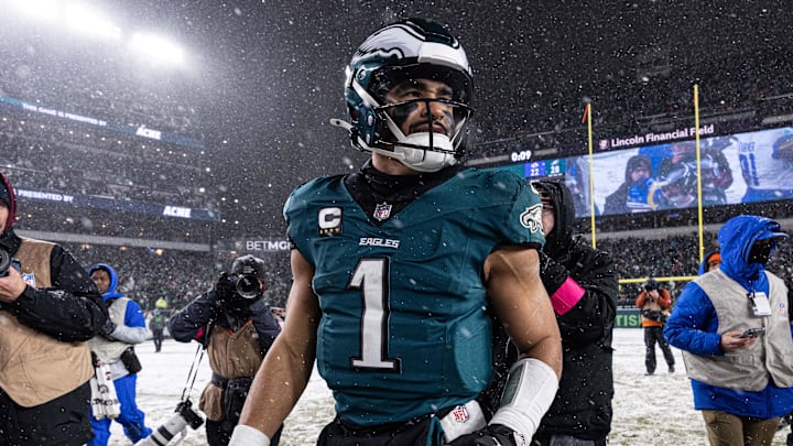 Jan 19, 2025; Philadelphia, Pennsylvania, USA; Philadelphia Eagles quarterback Jalen Hurts (1) walks the field after a victory against the Los Angeles Rams in a 2025 NFC divisional round game at Lincoln Financial Field. Mandatory Credit: Bill Streicher-Imagn Images