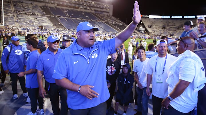 Kalani Sitake waves to the BYU student section in gratitude for a great environment against Kansas State.