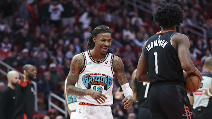 Jan 13, 2025; Houston, Texas, USA; Memphis Grizzlies guard Ja Morant (12) smiles after a play during the second quarter against the Houston Rockets at Toyota Center. Mandatory Credit: Troy Taormina-Imagn Images