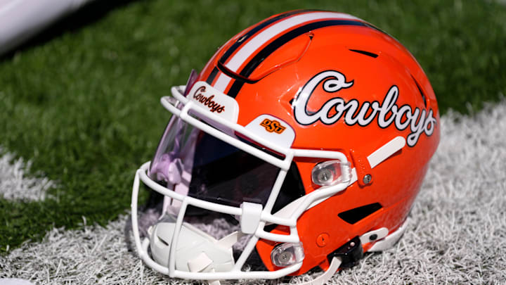 An Oklahoma State helmet is pictured before a college football game between the Oklahoma State Cowboys (OSU) and the West Virginia Mountaineers at Boone Pickens Stadium in Stillwater, Okla., Saturday, Oct. 5, 2024. An Oklahoma State helmet is pictured before a college football game between the Oklahoma State Cowboys (OSU) and the West Virginia Mountaineers at Boone Pickens Stadium in Stillwater, Okla., Saturday, Oct. 5, 2024.