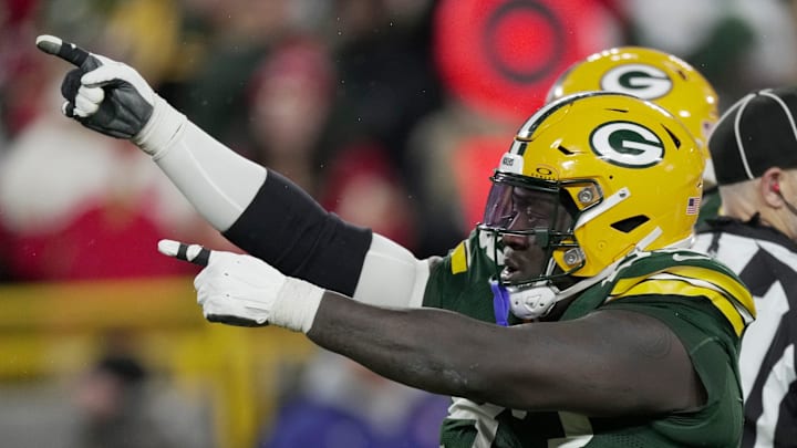 Green Bay Packers defensive tackle T.J. Slaton (93) celebrates a fumble recovery by defensive tackle Kenny Clark during the fourth quarter of their game Sunday, November 24, 2024 at Lambeau Field in Green Bay, Wisconsin. The Green Bay Packers beat the San Francisco 49ers 38-10. Green Bay Packers defensive tackle T.J. Slaton (93) celebrates a fumble recovery by defensive tackle Kenny Clark during the fourth quarter of their game Sunday, November 24, 2024 at Lambeau Field in Green Bay, Wisconsin. The Green Bay Packers beat the San Francisco 49ers 38-10.