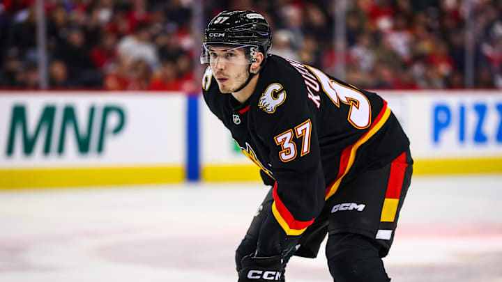 Mar 7, 2026; Calgary, Alberta, CAN; Calgary Flames defenseman Yan Kuznetsov (37) against the Carolina Hurricanes during the second period at Scotiabank Saddledome. Mandatory Credit: Sergei Belski-Imagn Images Mar 7, 2026; Calgary, Alberta, CAN; Calgary Flames defenseman Yan Kuznetsov (37) against the Carolina Hurricanes during the second period at Scotiabank Saddledome. Mandatory Credit: Sergei Belski-Imagn Images