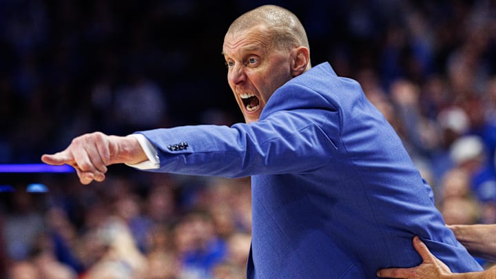 Dec 13, 2025; Lexington, Kentucky, USA; Kentucky Wildcats head coach Mark Pope yells to his players during the second half against the Indiana Hoosiers at Rupp Arena at Central Bank Center. Mandatory Credit: Jordan Prather-Imagn Images