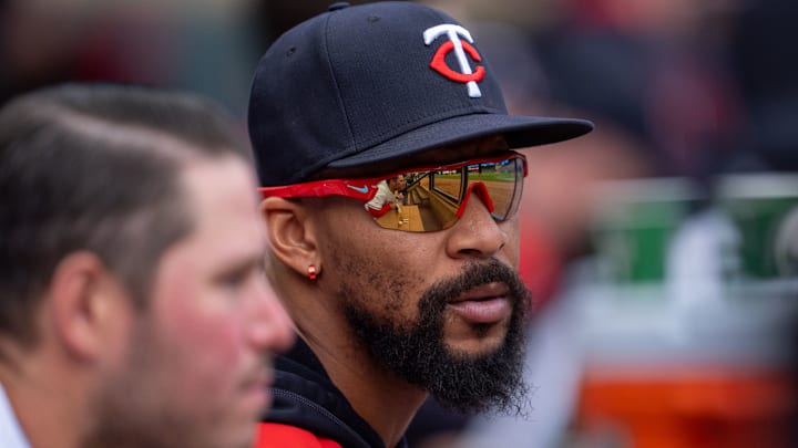 Minnesota Twins outfielder Byron Buxton, right, talks with first baseman Ty France in the bottom of the fifth inning against the Kansas City Royals at Target Field in Minneapolis on May 24, 2025.
