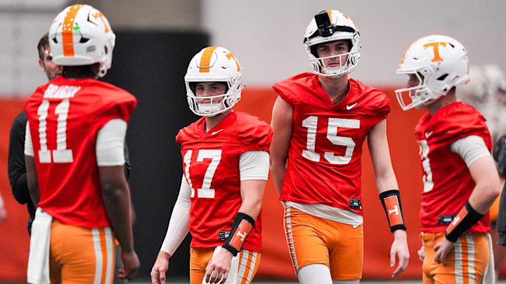 Tennessee quarterbacks, from left, Faizon Brandon (11), Ryan Staub (17), George MacIntyre (15) and Mason Phillips (13) during the Vols' first spring football practice in Knoxville on March 16, 2026.