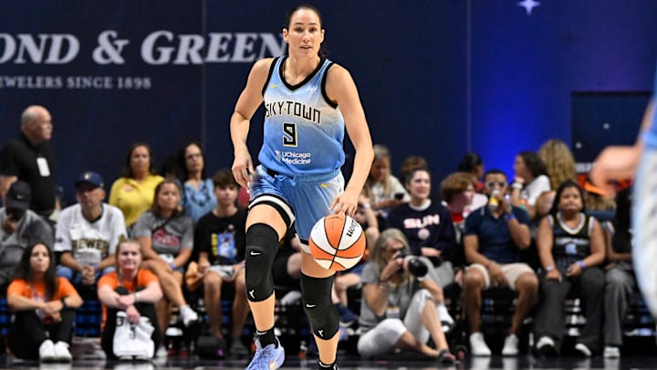 Aug 13, 2025; Uncasville, Connecticut, USA; Chicago Sky guard Rebecca Allen (9) dribbles against the Connecticut Sun during the first half at Mohegan Sun Arena. Mandatory Credit: Eric Canha-Imagn Images