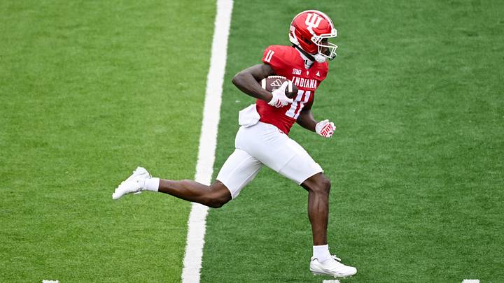 Sep 12, 2026; Bloomington, Indiana, USA; Indiana Hoosiers wide receiver Nick Marsh (11) catches a pass that he would run in for a touchdown against the Howard Bison during the second half at Merchants Bank Field at Memorial Stadium. Mandatory Credit: Robert Goddin-Imagn Images