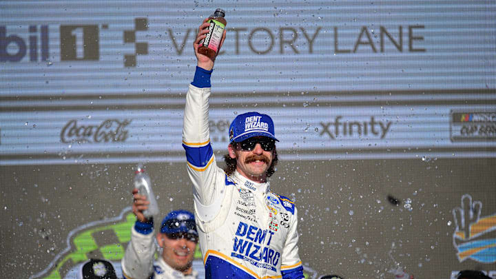 Mar 8, 2026; Avondale, Arizona, USA; Team Penske driver Ryan Blaney (12) celebrates his victory of the Straight Talk Wireless 500 at Phoenix Raceway.