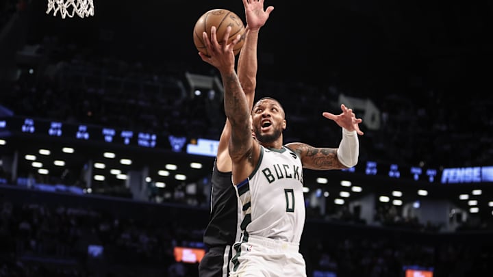 Oct 27, 2024; Brooklyn, New York, USA;  Milwaukee Bucks guard Damian Lillard (0) drives to the basket in the first quarter against the Brooklyn Nets at Barclays Center. Mandatory Credit: Wendell Cruz-Imagn Images