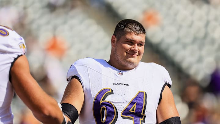 Oct 6, 2024; Cincinnati, Ohio, USA; Baltimore Ravens center Tyler Linderbaum (64) during warmups before the game against the Cincinnati Bengals at Paycor Stadium. Mandatory Credit: Katie Stratman-Imagn Images