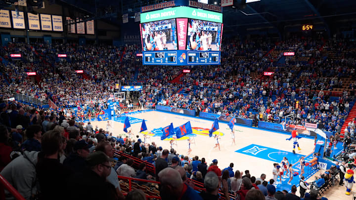 Fans yell out as the Kansas Jayhawks enter the court before the game against Texas A&M-Corpus Christi Islanders inside Allen Fieldhouse on Nov. 11, 2025.