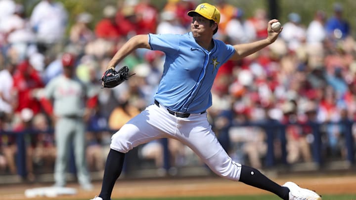 Mar 7, 2024; Port Charlotte, Florida, USA;  Tampa Bay Rays starting pitcher Jacob Lopez (74) throws a pitch against the Philadelphia Phillies in the second inning at Charlotte Sports Park. Mandatory Credit: Nathan Ray Seebeck-Imagn Images