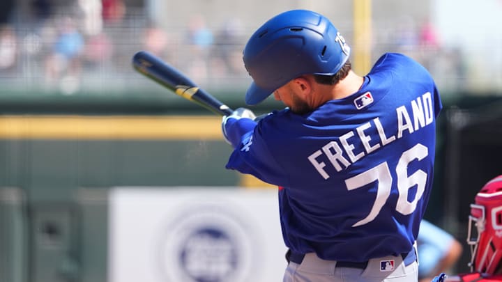 Mar 5, 2026; Goodyear, Arizona, USA; Los Angeles Dodgers shortstop Alex Freeland (76) bats against the Cincinnati Reds during the first inning at Goodyear Ballpark. Mandatory Credit: Joe Camporeale-Imagn Images