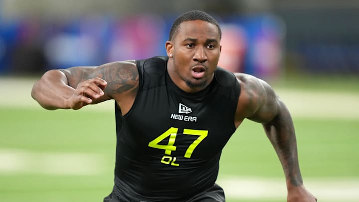 Boston College defensive lineman Donovan Ezeiruaku participates in drills during the 2025 NFL Combine at Lucas Oil Stadium. 