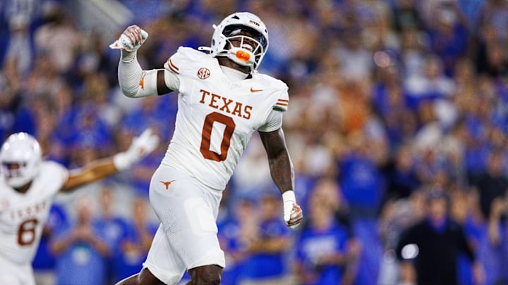 Texas Longhorns linebacker Anthony Hill Jr. celebrates after the Kentucky Wildcats fail to score in overtime at Kroger Field. Texas Longhorns linebacker Anthony Hill Jr. celebrates after the Kentucky Wildcats fail to score in overtime at Kroger Field.