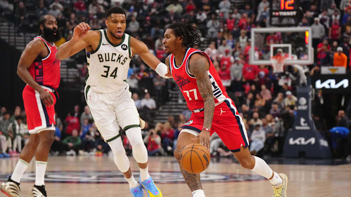 Jan 25, 2025; Inglewood, California, USA; LA Clippers guard Kevin Porter Jr. (77) dribbles the ball against Milwaukee Bucks forward Giannis Antetokounmpo (34) in the first half at Intuit Dome. Mandatory Credit: Kirby Lee-Imagn Images