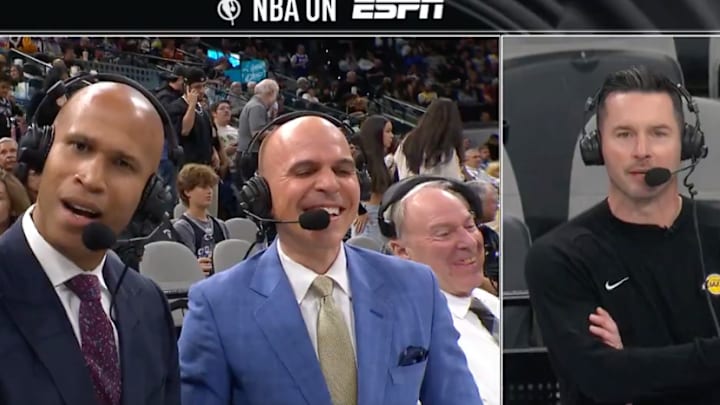 Los Angeles Lakers coach JJ Redick speaks with former ESPN coworkers Richard Jefferson (left) and Ryan Ruocco (right) during halftime of an NBA Cup group-play game vs. the San Antonio Spurs on November 15, 2024. 