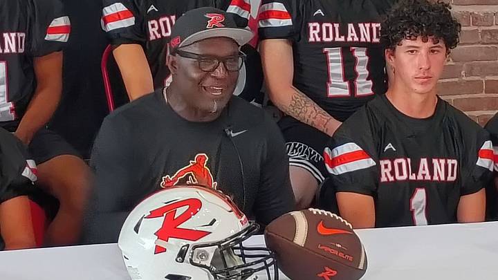 New Roland (Oklahoma) head football coach Kenyatta Wright speaks at a media days session in August of 2026. New Roland (Oklahoma) head football coach Kenyatta Wright speaks at a media days session in August of 2026.