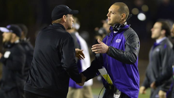 Vince Kehres (right) during his time at Mount Union (Division III). He's compiled a 95-6 record as a head coach before becoming the defensive coordinator at Toledo for the last six years. 