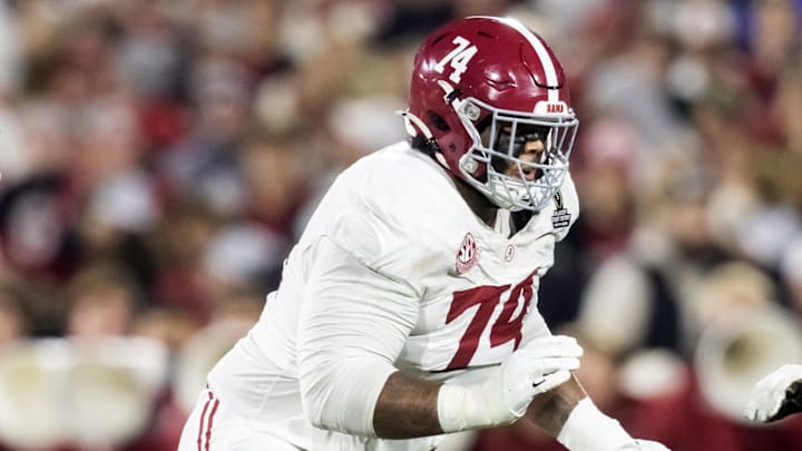 Alabama Crimson Tide offensive lineman Kadyn Proctor (74) against the Oklahoma Sooners during the CFP National Playoff First Round at Gaylord Family Oklahoma Memorial Stadium.