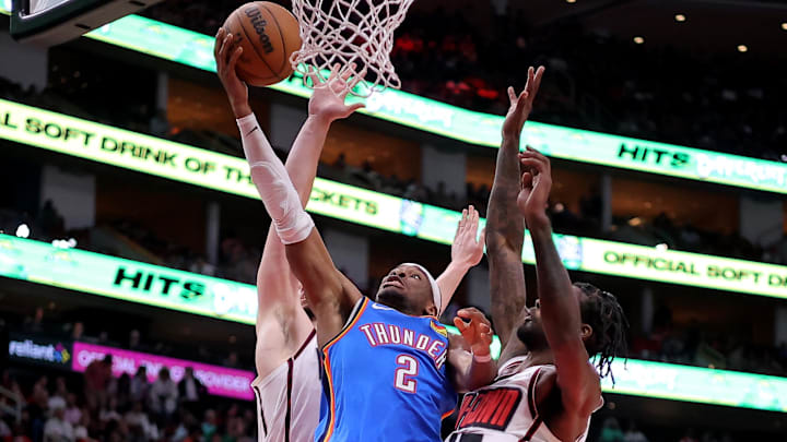 Apr 4, 2025; Houston, Texas, USA; Oklahoma City Thunder guard Shai Gilgeous-Alexander (2) makes a layup during the third quarter at Toyota Center. Mandatory Credit: Erik Williams-Imagn Images Apr 4, 2025; Houston, Texas, USA; Oklahoma City Thunder guard Shai Gilgeous-Alexander (2) makes a layup during the third quarter at Toyota Center. Mandatory Credit: Erik Williams-Imagn Images