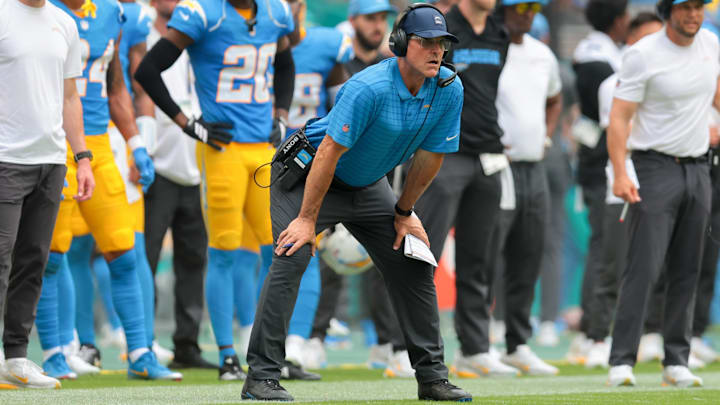 Los Angeles Chargers head coach Jim Harbaugh watches from the sideline against the Miami Dolphins