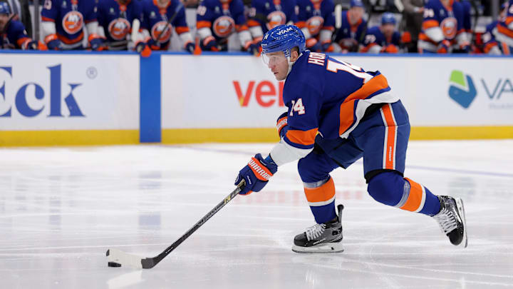 Jan 24, 2026; Elmont, New York, USA; New York Islanders center Bo Horvat (14) skates with the puck against the Buffalo Sabres during the second period at UBS Arena. Mandatory Credit: Brad Penner-Imagn Images