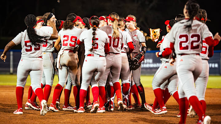 Nebraska softball players celebrate after beating No. 6 Tennessee to open the 2025 season. Nebraska softball players celebrate after beating No. 6 Tennessee to open the 2025 season.