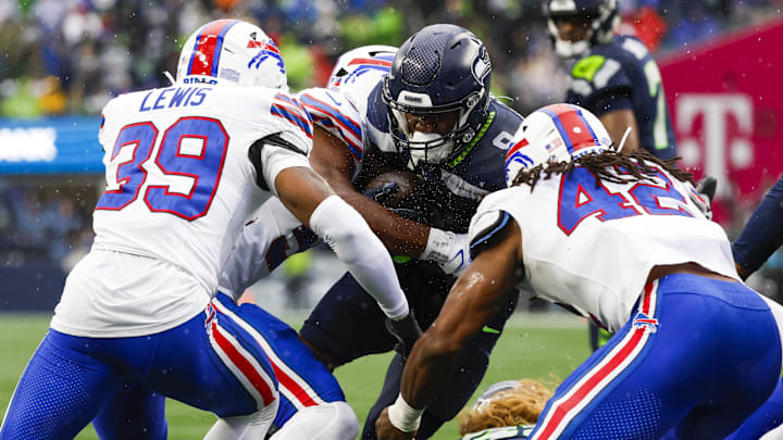 Oct 27, 2024; Seattle, Washington, USA; Seattle Seahawks running back Kenneth Walker III (9) rushes against the Buffalo Bills during the second quarter at Lumen Field. Oct 27, 2024; Seattle, Washington, USA; Seattle Seahawks running back Kenneth Walker III (9) rushes against the Buffalo Bills during the second quarter at Lumen Field.