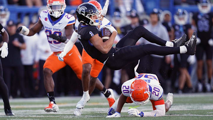 San Jose State Spartans wide receiver Nick Nash is tackled by Boise State Broncos cornerback Davon Banks.