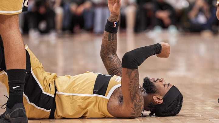 Feb 26, 2026; Atlanta, Georgia, USA; Washington Wizards guard Jaden Hardy (8) reacts after being knocked to the floor against the Atlanta Hawks during the second half at State Farm Arena. Mandatory Credit: Dale Zanine-Imagn Images