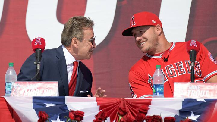 Mar 24, 2019; Anaheim, CA, USA; Los Angeles Angels center fielder Mike Trout (right) talks with Angels owner Arte Moreno at a press conference to announce a 12 year contract extension at Angel Stadium of Anaheim. Mandatory Credit: Kirby Lee-USA TODAY Sports