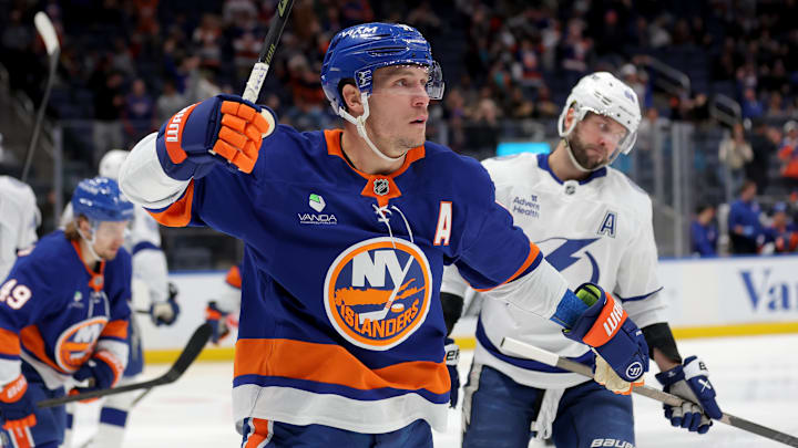 Dec 2, 2025; Elmont, New York, USA; New York Islanders center Bo Horvat (14) celebrates his goal against the Tampa Bay Lightning during the second period at UBS Arena. Mandatory Credit: Brad Penner-Imagn Images Dec 2, 2025; Elmont, New York, USA; New York Islanders center Bo Horvat (14) celebrates his goal against the Tampa Bay Lightning during the second period at UBS Arena. Mandatory Credit: Brad Penner-Imagn Images