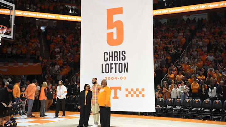 Chris Lofton poses for a photo with his family during a game between the Tennessee Vols and the Kentucky Wildcats, in Thompson-Boling Arena, in Knoxville, Tenn., Saturday, Jan. 14, 2023.

Volskentucky0114 1367