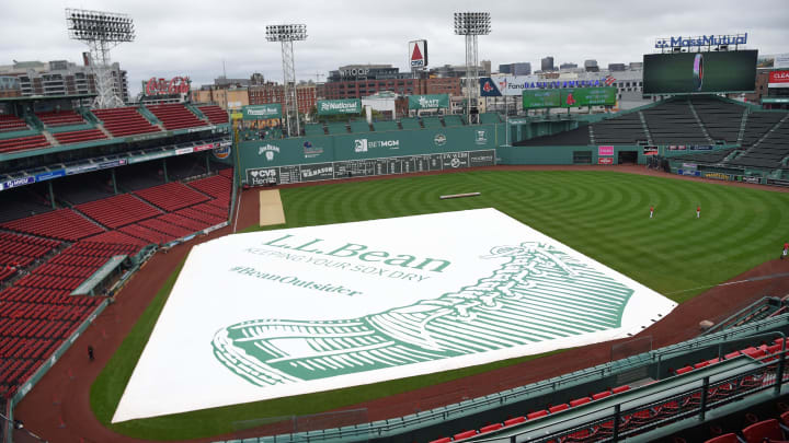 Sep 24, 2023; Boston, Massachusetts, USA; Overview of the tarp on the field prior to a game between Sep 24, 2023; Boston, Massachusetts, USA; Overview of the tarp on the field prior to a game between